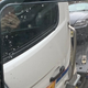 A 2007 BMW Z4 on the back of a tow truck after breaking down